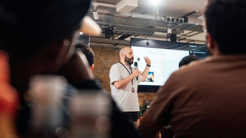 man giving a presentation at an event