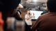 man giving a presentation at an event